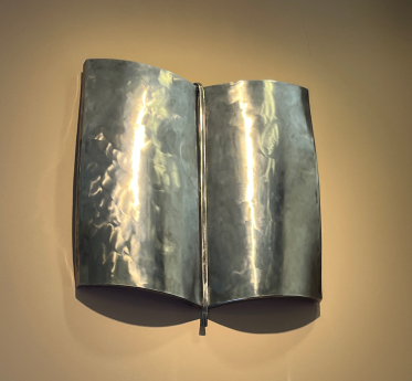 Stainless steel book sculpture