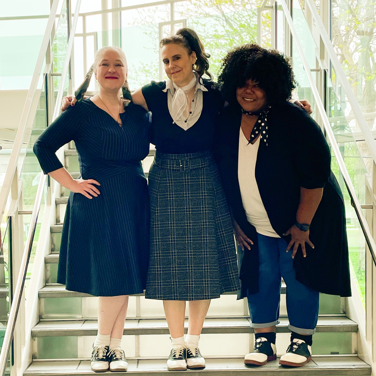 three women dressed in retro style